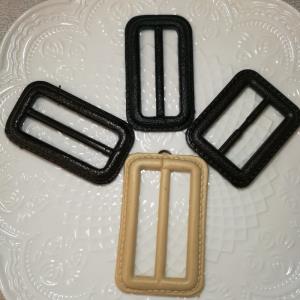 仿皮扣