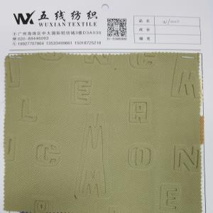 梭织斜纹英文图案压花料